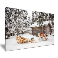 Festive Reindeer Snowy Log Cabin Lapland
